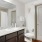 a bathroom with a marble countertop