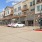 a street with cars parked on the side