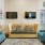 a living room with a couch and chairs