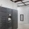 a room with a table and a large black cabinet