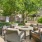 a patio with a table and chairs