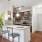 a kitchen with a marble island