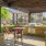 a patio with a table and chairs