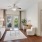 a bedroom with a bed and a chair